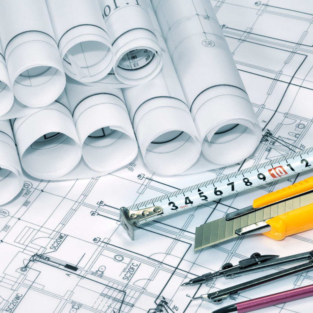 blueprints and tape measure