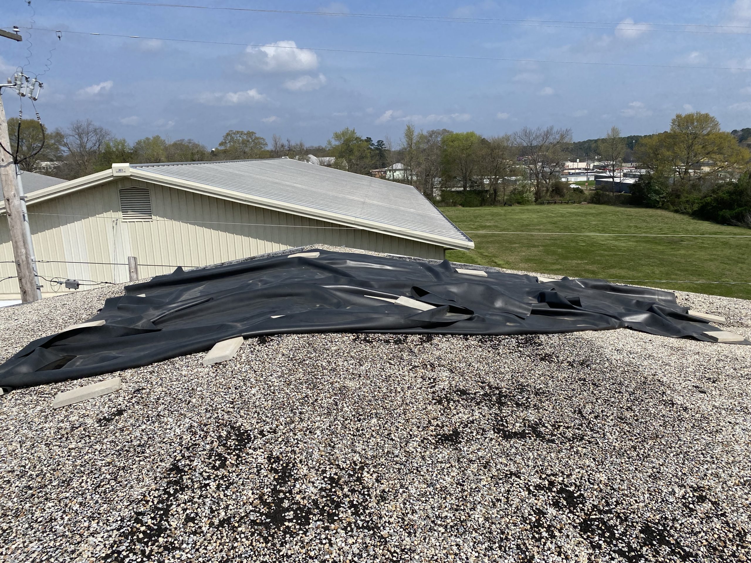 black tarp on roof